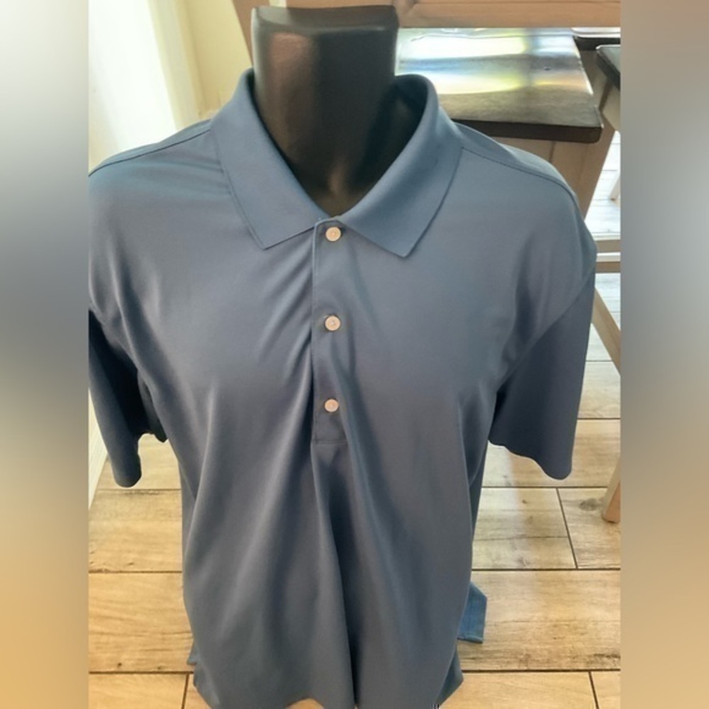 Men’s used Greg Norman size XL blue play dry golf polo shirt
